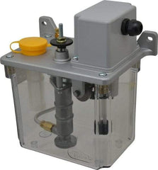 Trico - 2 L Reservoir Capacity, 3 - 6 cm Output per Cycle, 6-12 cm Output per Hour, Electric Central Lubrication System - 30 Min Interval Between Cycles, 130mm Wide x 225mm High, 110 Volts, Oil, 5/16-24 Outlet Thread - A1 Tooling