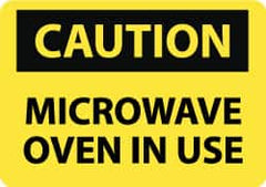 NMC - "Caution - Microwave Oven in Use", 7" Long x 10" Wide, Pressure-Sensitive Vinyl Safety Sign - Rectangle, 0.004" Thick, Use for Accident Prevention - A1 Tooling