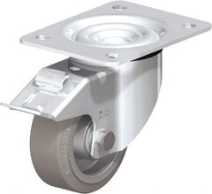 Blickle - 4" Diam x 1-37/64" Wide x 5-7/64" OAH Top Plate Mount Swivel Caster with Brake - Solid Rubber, 440 Lb Capacity, Ball Bearing, 5-1/2 x 4-3/8" Plate - A1 Tooling