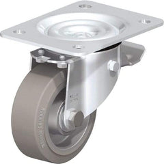 Blickle - 4" Diam x 1-37/64" Wide x 5-7/64" OAH Top Plate Mount Swivel Caster with Brake - Solid Rubber, 440 Lb Capacity, Ball Bearing, 5-1/2 x 4-3/8" Plate - A1 Tooling